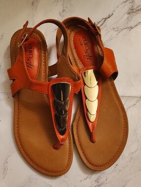 Women's Orange Leather Thong Sandals with Gold Accent Plates